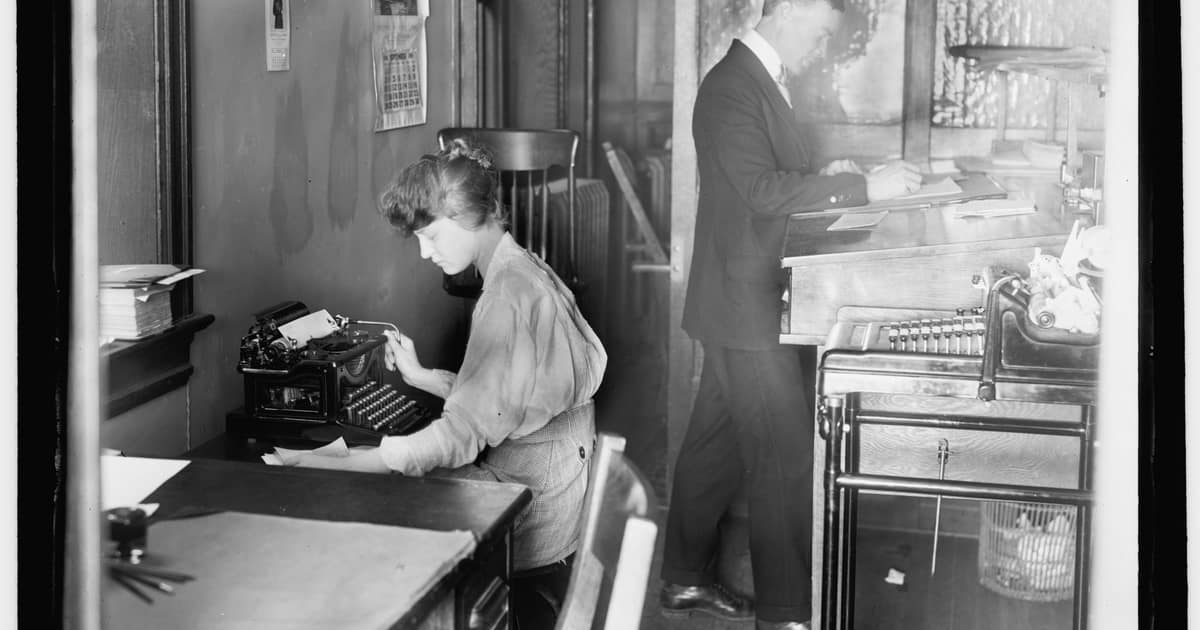 A historic accountant's office with clerks at their desks, the kind of practice local SEO for accountants helps clients find