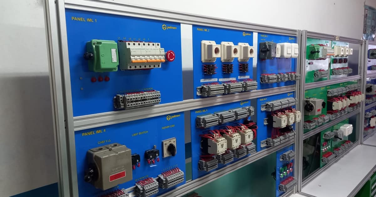A wall of labeled electrical control panels and wiring, the technical work local SEO for electricians should convey.
